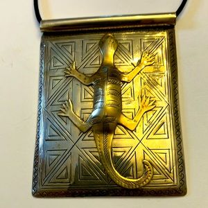 Sterling pendant with brass gecko